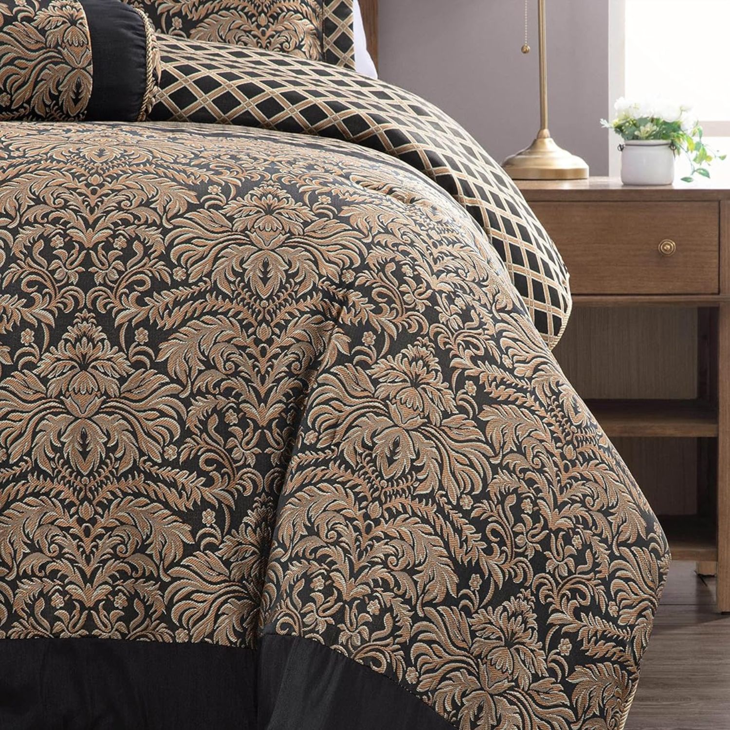 Best luxury bedding sets — close-up of Imperial Damask quilt cover draping over bed foot, room setting with timber bedside table